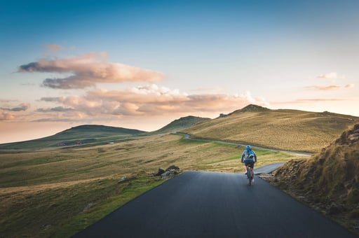 An SAP employee cycling into the distance - SAP Automation